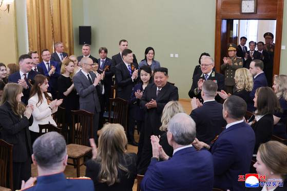 North Korean leader Kim Jong-un, center, visits the Russian Embassy in Pyongyang with his daughter Ju-ae, left, on the morning of May 9 to mark the 80th anniversary of Russia’s Victory Day. [KOREAN CENTRAL NEWS AGENCY]