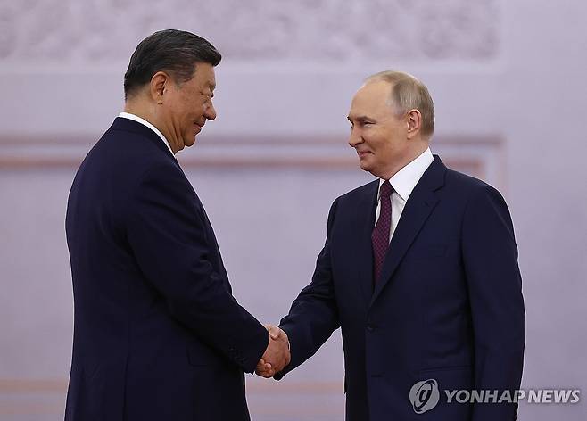 시진핑 중국 국가주석(왼쪽)과 푸틴 러시아 대통령 [EPA 연합뉴스. 재판매 및 DB 금지]