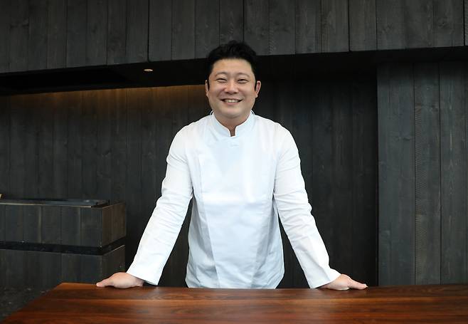 Chef Jang Ho-joon of Negi Live poses for a photo at his restaurant in Seongsu-dong, Seoul. /Cho In-won