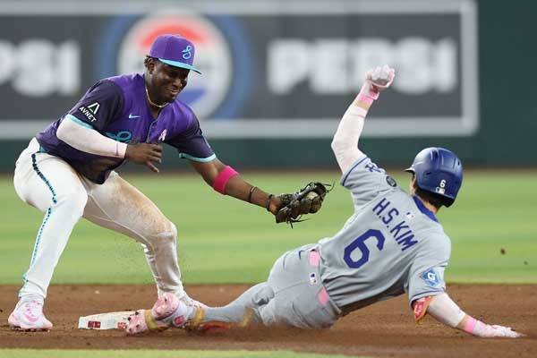 김혜성은 간발의 차로 아웃됐다. 사진= Getty Images/AFP= 연합뉴스 제공