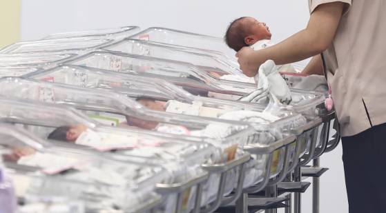 A nurse takes care of a newborn at a hospital in Incheon on Dec. 26, 2024. [NEWS1]