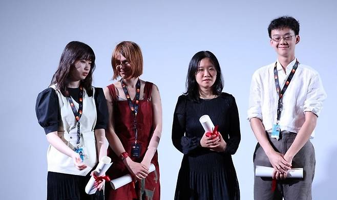 Heo Ga-young (second from right) poses with La Cinef winners at Cannes' Bunuel Theatre on Thursday. (Festival de Cannes)