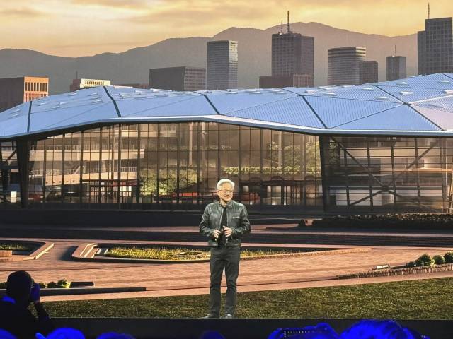 젠슨 황 엔비디아 최고경영자가 19일 타이베이 뮤직센터에서 기조연설을 하며 대만에 설립 예정인 엔비디아의 사옥 계획에 대해 소개하고 있다. /연합뉴스