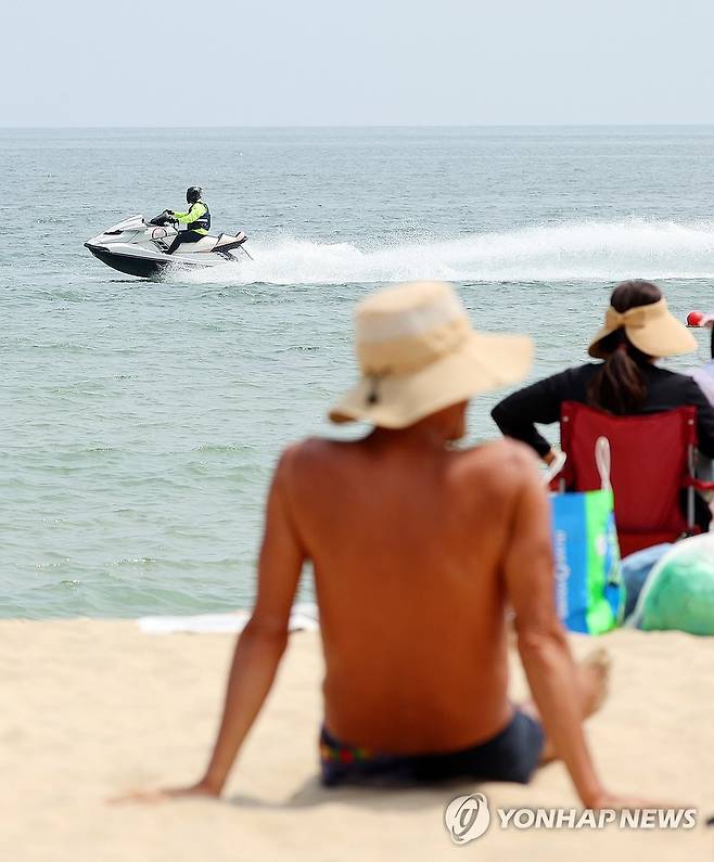 지난해 여름 부산 해운대 해수욕장의 피서객 [연합뉴스 자료사진. 사진은 기사 내용과 직접 관련 없음]