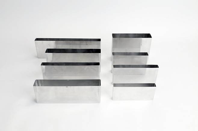 상신이디피㈜ 중대형 CAN 제품. 상신이디피㈜ 제공