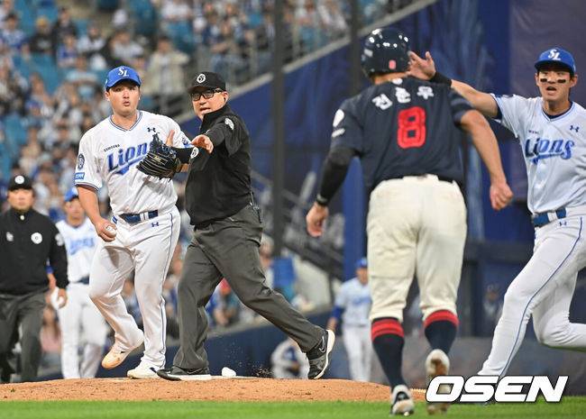 [OSEN=대구, 이석우 기자] 29일 대구삼성라이온즈파크에서 2025 신한 SOL 뱅크 KBO 리그 삼성 라이온즈와 롯데 자이언츠의 경기가 열렸다. 홈팀 삼성은 최원태가, 방문팀 롯데는 박세웅이 선발 출전했다. 5회초 2사 삼성 라이온즈 선발 투수 최원태와 투구에 맞은 롯데 자이언츠 전준우가 충돌하려 하자 구자욱과 심판이 말리고 있다. 2025.05.29 / foto0307@osen.co.kr