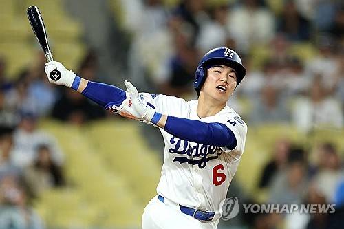 타격 후 아쉬워하는 김혜성. ⓒ연합뉴스 AFP
