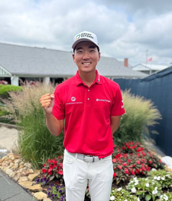 US오픈을 마친 뒤 환하게 웃으며 포즈를 취하고 있는 마이클 김. 임정우 기자