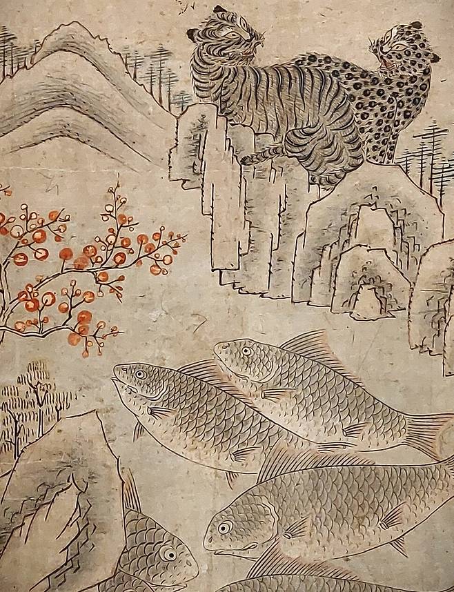 호랑이와 물고기들이 꽃 피는 산속 계곡을 배경으로 함께 등장하는 ‘어락도’ 2폭 병풍의 일부분. 국립민속박물관 소장품. 노형석 기자