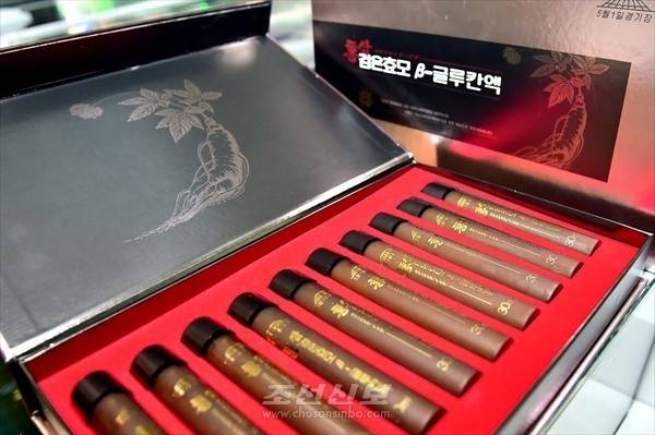 북한 오일건강식품생산소가 만든 '홍삼검은효모β-글루칸액' [조선신보 캡처]