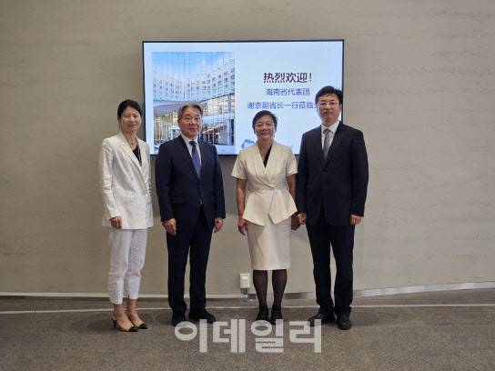 BioSolution CEO Lee Jeong-seon, Chairman Jang Song-sun, Hainan Vice Gove.