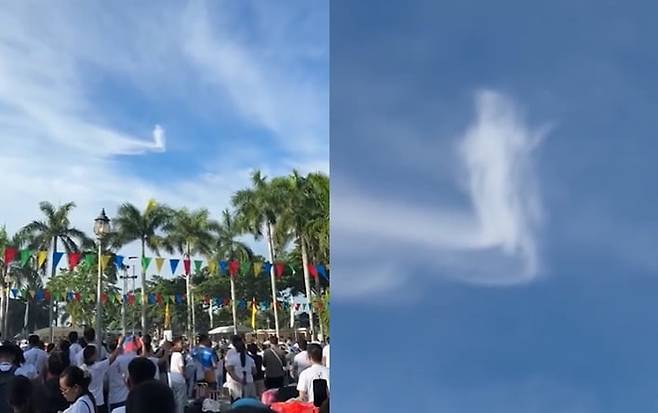 필리핀의 한 성당 상공에서 예수 그리스도 형상을 닮은 구름이 목격돼 화제가 됐다. /인스타그램 '아큐웨더'