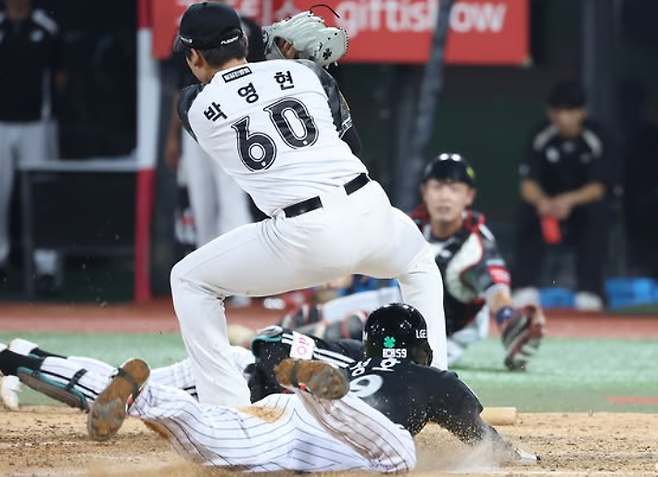 ▲ 천성호가 동점 득점을 올리는 순간. ⓒ LG 트윈스
