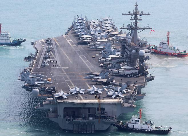 The U.S. Navy’s nuclear-powered aircraft carrier USS Carl Vinson departs the Busan naval base on March 7. /Yonhap