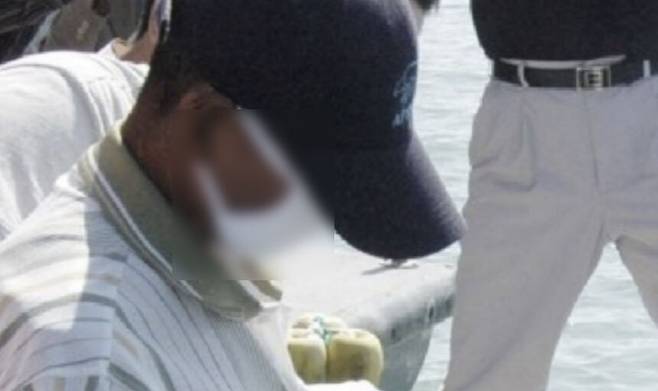 오종근이 체포 직후 현장검증을 하고 있는 모습. 연합뉴스