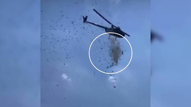 미국 디트로이트 상공에서 헬기가 수천 달러의 현금을 뿌렸다 / X(구 트위터) 캡처