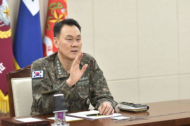 Kim Myung-soo, chairman of South Korea’s Joint Chiefs of Staff, speaks via video call with his US counterpart Gen. Dan Caine on May 20. (South Korea’s Joint Chiefs of Staff)