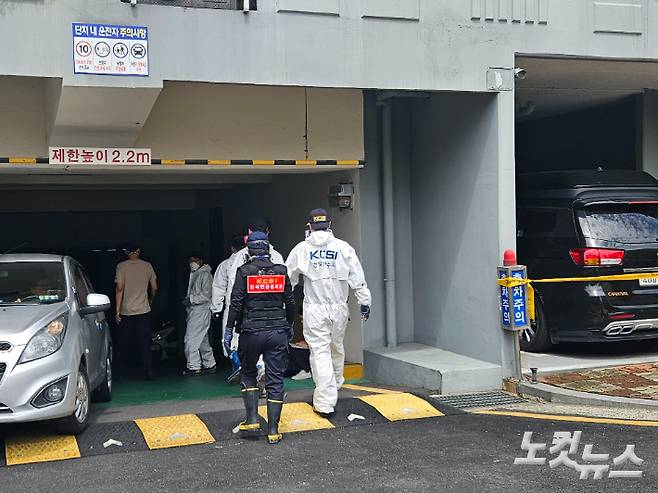 3일 화재가 난 부산 기장군의 한 아파트에서 부산경찰청 화재조사팀과 국과수, 부산소방재난본부, 전기안전공사 등이 합동감식을 진행하고 있다. 김혜민 기자