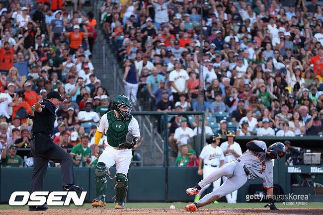 [사진] 이정후가 3회 윌리 아다메스의 적시타 때 홈을 밟아 득점을 올리고 있다. ⓒGettyimages(무단전재 및 재배포 금지)