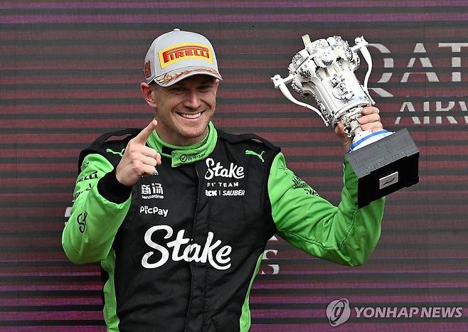 F1 데뷔 15시즌 만에 생애 첫 시상대에 오른 니코 휠켄베르크 [EPA=연합뉴스]