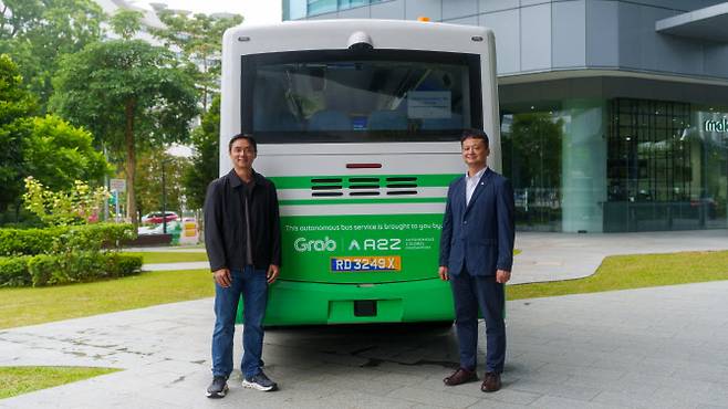 이위탕 그랩 운영 매니징 디렉터(왼쪽)와 김호진 오토노머스에이투지 사업개발실 상무 (사진=오토노머스에이투지)