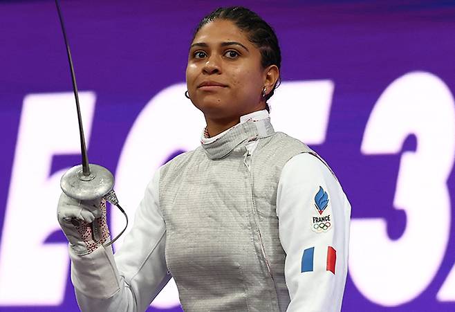 도핑 논란에 휩싸인 프랑스 펜싱 선수 이사오라 티뷔(34)가 남자친구와의 입맞춤을 통해 자신도 모르게 금지 약물이 체내에 들어왔다고 주장해 혐의를 벗었다./AFPBBNews=뉴스1