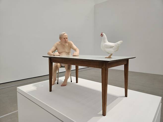 "Chicken / Man" by Ron Mueck is on view at MMCA Seoul. (Park Yuna/The Korea Herald)