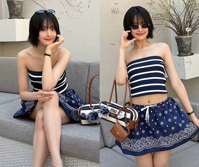 그룹 아이들의 민니가 12일 자신의 인스타그램에 청량한 리조트 무드의 사진 여러 장을 공개했다. 이국적 풍경보다 눈에 먼저 들어온 건, 민니만의 ‘바캉스 스타일’이었다.