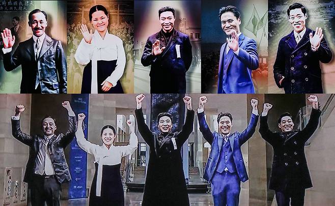 국립중앙박물관과 국사편찬위원회가 특별전 '광복 80주년, 다시 찾은 얼굴들'을 15일 서울 용산구 국립중앙박물관 상설전시관 1층 대한제국실에서 공동 개막한 가운데 전시관 화면에 인공지능(AI) 기술로 구현한 안창호, 유관순, 안중근, 윤봉길, 이봉창 독립운동가의 미소짓는 영상이 재생되고 있다.