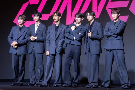 Monsta X poses for photos during a press conference in western Seoul on July 16, ahead of its 10th anniversary concert. [DANIELA GONZALEZ PEREZ]