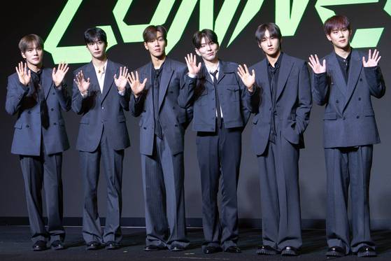 Monsta X poses for photos during a press conference in western Seoul on July 16, ahead of its 10th anniversary concert. [DANIELA GONZALEZ PEREZ]