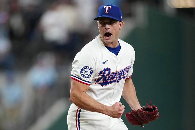 <yonhap photo-2179="">지난 시즌 텍사스에서 활약한 데이비드 로버트슨. [AFP=연합뉴스]</yonhap>