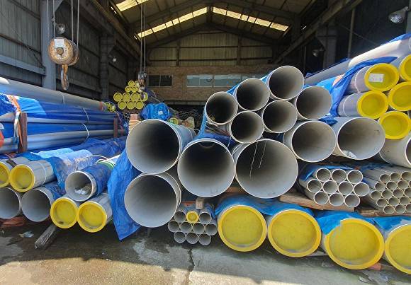 부산 사상구의 한 상수도관 유통업체에 파이프가 쌓여있는 모습. [사진=부산 사상경찰서]