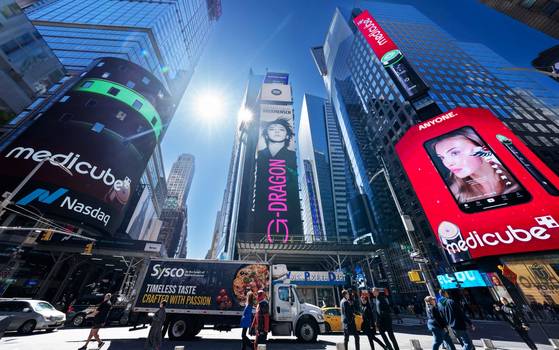Korean beauty seller APR's Medicube brand is promoted on Times Square electronic billboards in March. [APR]