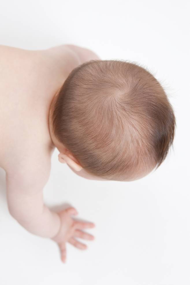 A baby in a prone position (123rf)