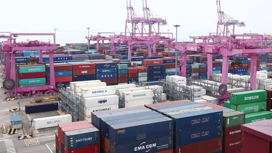 Trade containers are stacked at a port in Incheon on July 31. [NEWS1]