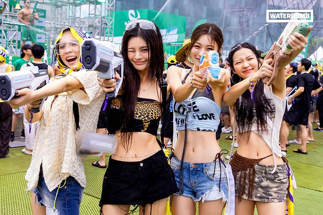 Visitors enjoy Korea's annual summer water fight and music festival Waterbomb. [MADEONE]