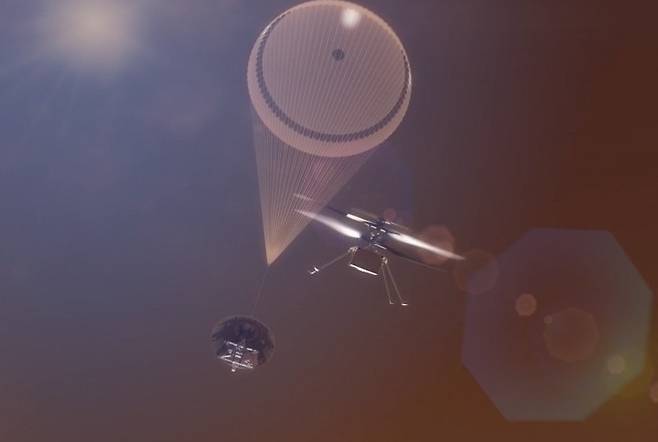 화성 하늘에 투입된 비행 캡슐(낙하산을 펼친 원뿔형 물체)에서 방출된 무인 헬기가 회전 날개를 돌리며 공중에 떠 있는 상상도. 에어로바이런먼트 제공