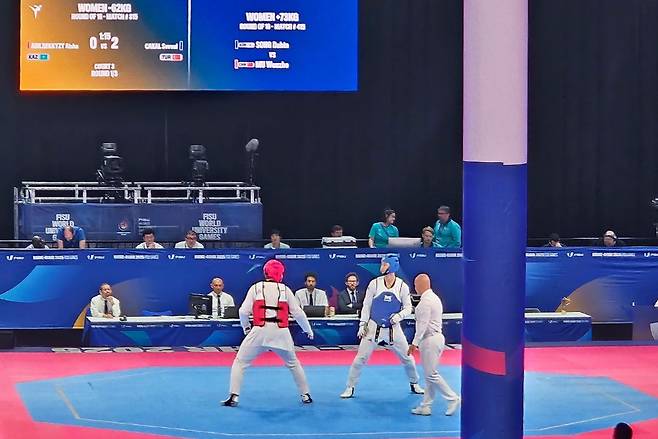 2025 라인루르 하계세계대학경기대회 태권도 겨루기 경기에서 한국 선수가 대결을 펼치고 있다. /사진=고신대 제공