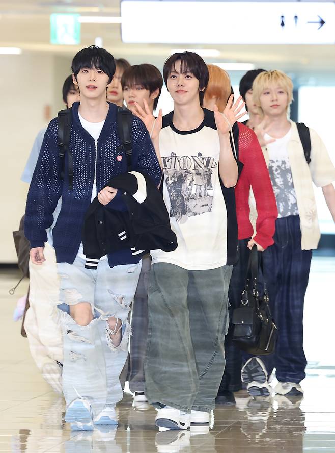 Boy band AHOF is seen at the Gimpo International Airport in western Seoul on Aug. 8, on its way to Japan for promotional events. [NEWS1]