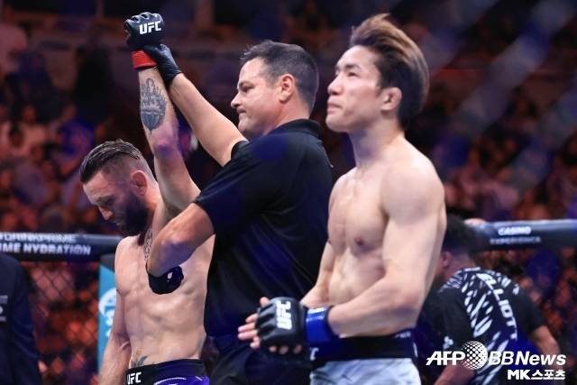 아사쿠라 카이는 17일(한국시간) 미국 일리노이주 시카고 유나이티드 센터에서 열린 팀 엘리엇과의 UFC 319 메인 이벤트 플라이급 매치에서 2라운드 서브미션 패배했다. 사진(시카고 미국)=AFPBBNews=News1