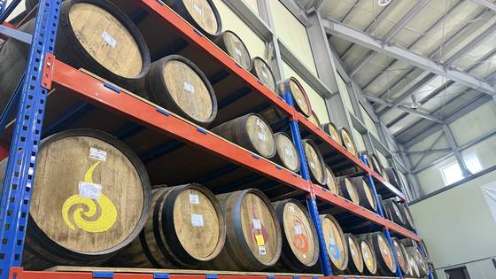 Casks are stacked inside Kimchangsoo Whiskey's distillery in Gimpo [WOO JI-WON]