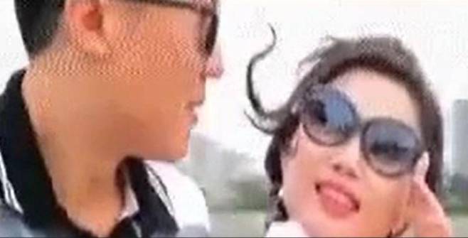 북한 내부 영상에 타락한 인간들이라고 등장한 신혼 부부의 모습. 동아일보 DB
