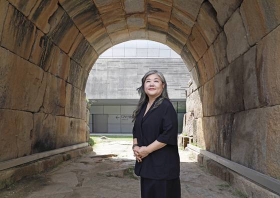Curator Cho Hye-young poses for photos at Dongdaemun Design Plaza in Jung District, central Seoul, on Aug. 30. [PARK SANG-MOON]