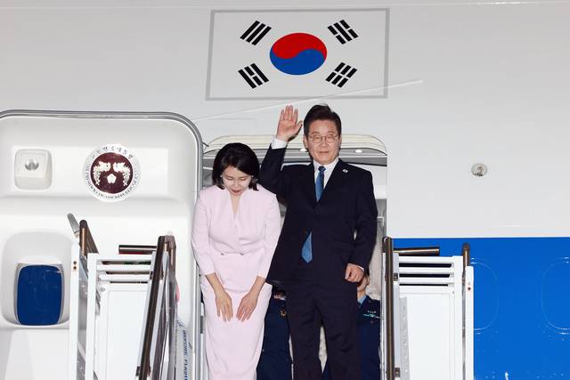 미국 방문 일정 마친 이재명 대통령 부부. 연합뉴스