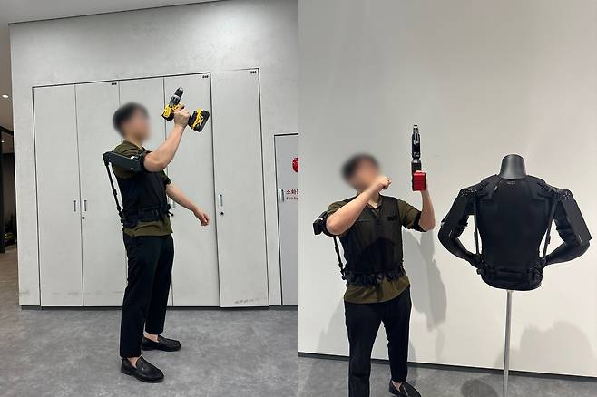 기자가 산업용 착용 로봇 ‘엑스블 숄더(X-ble Shoulder)’을 직접 체험하고 있는 모습. [김영철 기자]