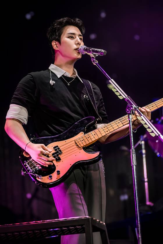 DAY6 member Young K sings during its 10th anniversary tour ″The Decade″ at the Goyang Stadium in Goyang, Gyeonggi, on Sunday, [JYP ENTERTAINMENT]