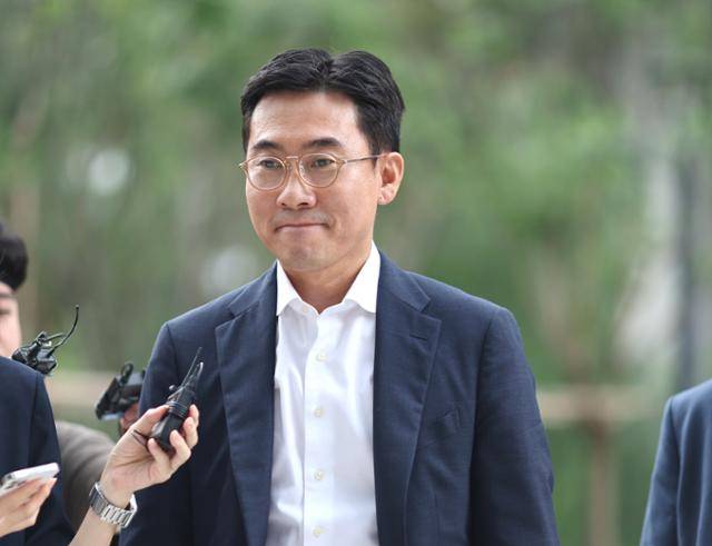 조영탁 IMS모빌리티 대표가 지난달 20일 서울 종로구 민중기 특별검사팀 사무실에 2차 소환조사를 받기 위해 출석하고 있다. 연합뉴스