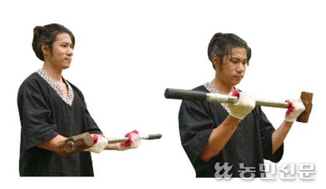 망치를 이용한 해머 컬. 알통 키우는 데 이만 한 게 없다.