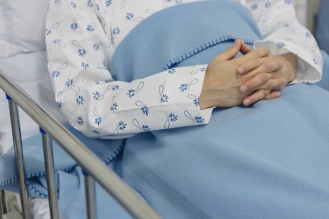 여성 환자 이미지. 기사와 관련 없음. 아이클릭아트